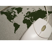 Picture of a computer mouse on a world map